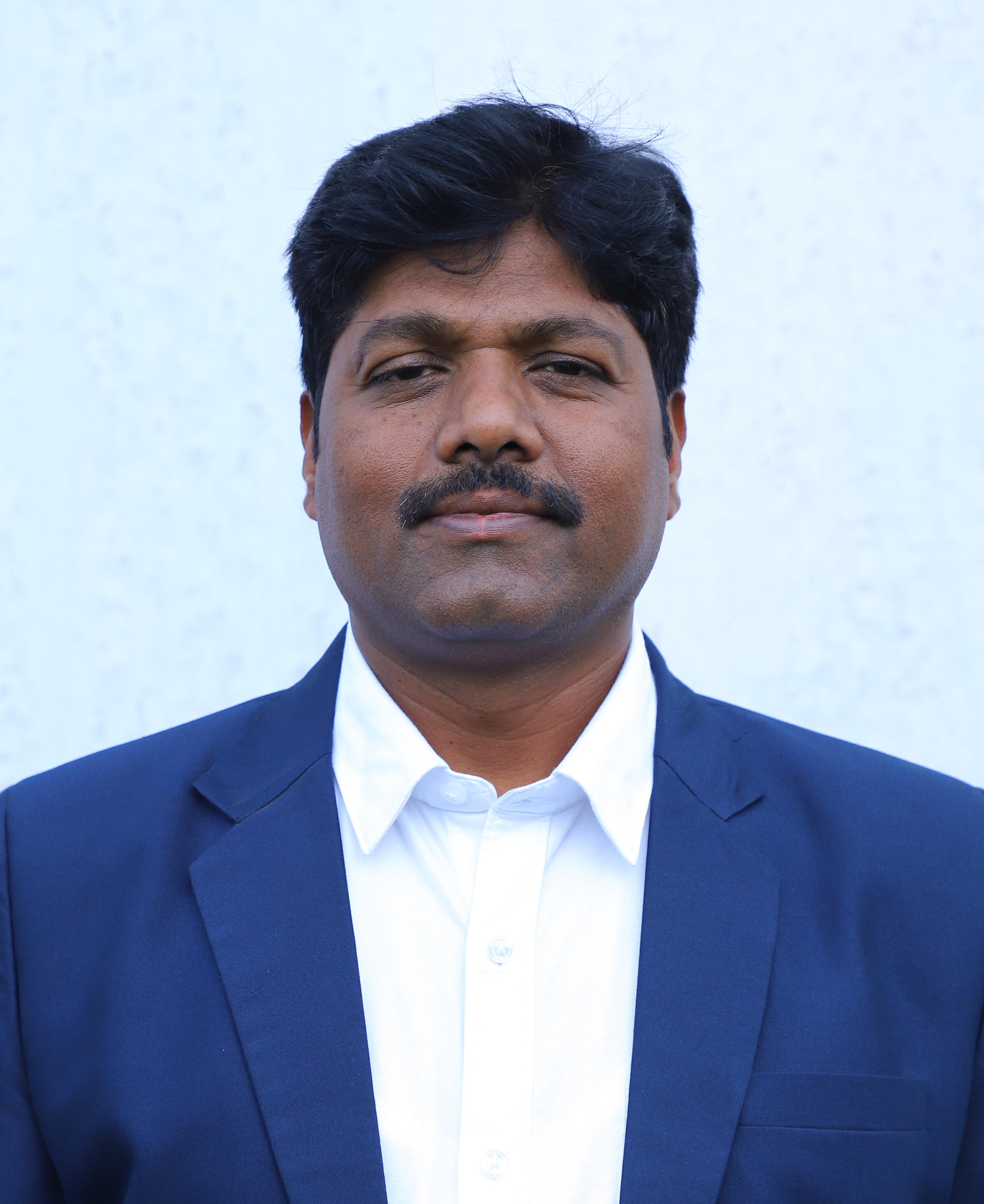 PROF. R. K. KAMBLE